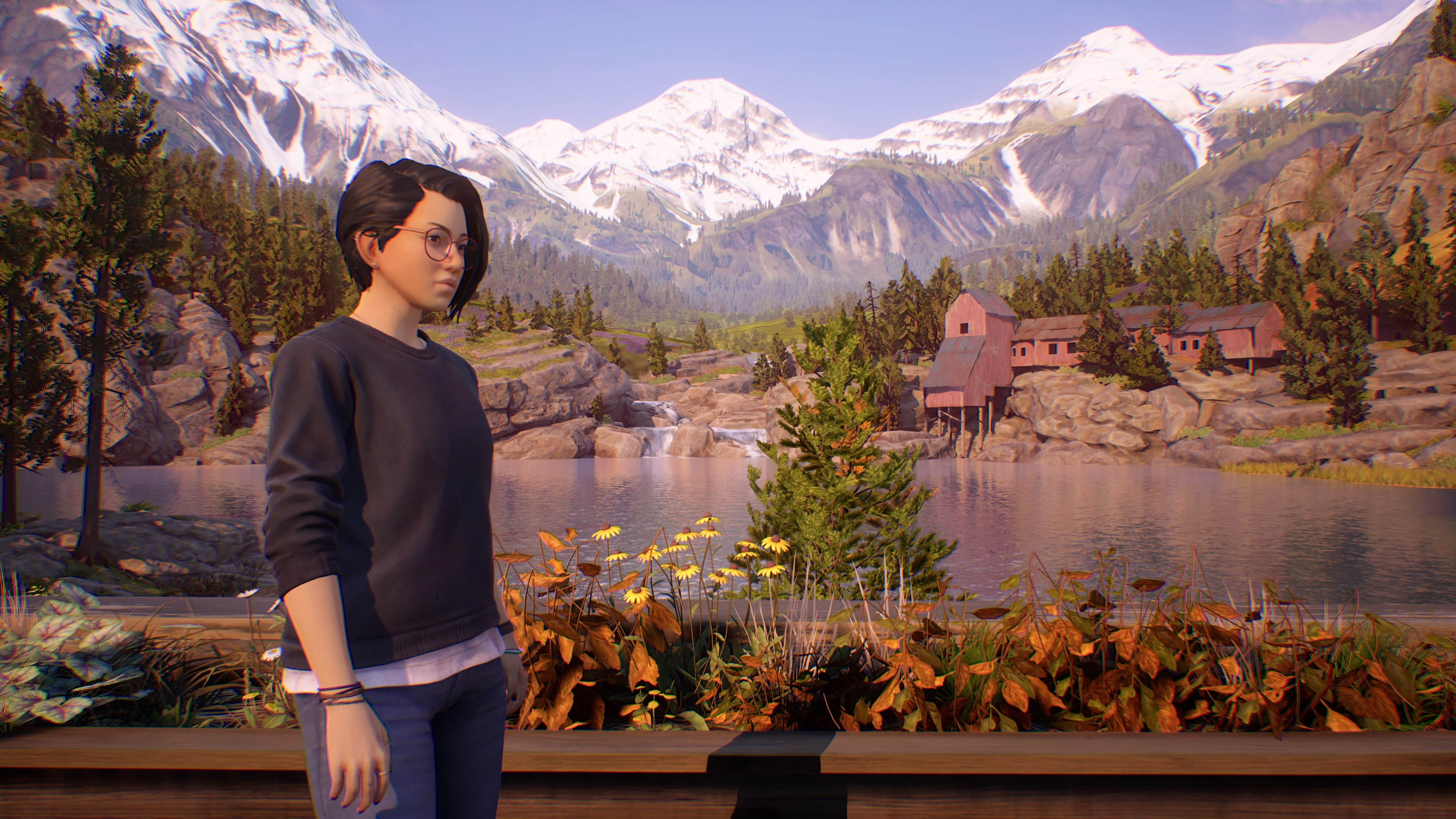 Alex Chen, the main protagonist overlooking a river running through the town of Haven Springs