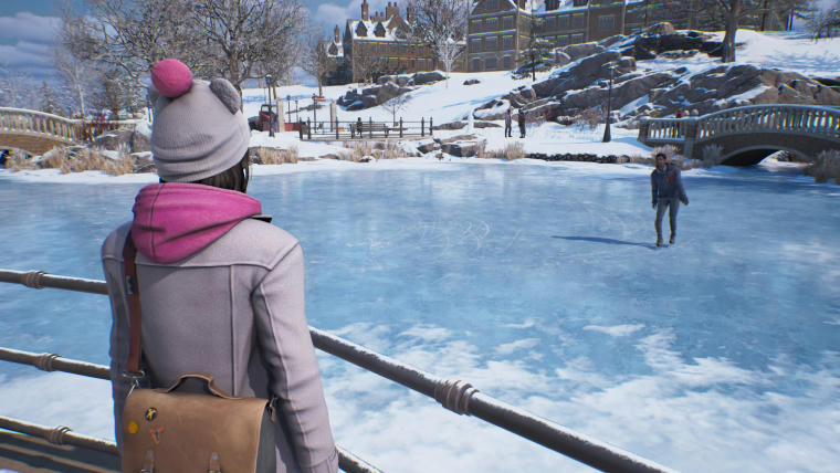 Max Caulfield in a winter get-up: a light-grey winter hat with two cat-ears and a pink pompom), a matching pink hoodie covered by a matching light-grey winter coat. She has a brown bag with stickers. The strap is across her shoulder and the bag is resting against her back. Said back is facing us whilst Max is looking at a frozen pond where a single person is ice-skating. It is winter there with lots of snow everywhere.